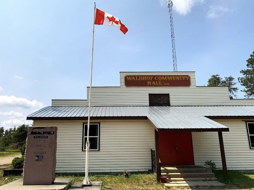 Waldhof Community Hall exterior showing the 1946 sign